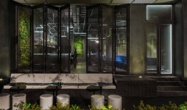 outside view of a modern bar with black interior and extraordinary lighting in shanghai, called The Botanist 4