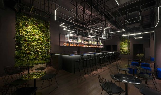 modern bar with black interior in shanghai, called The Botanist