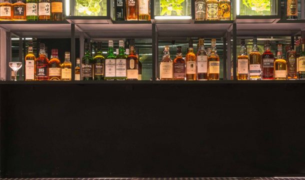 modern bar with black interior and extraordinary lighting in shanghai, called The Botanist